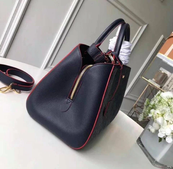 LV Montaigne MM Monogram Empreinte Leather Handle Shoulder Bag with Navy Blue Leather Trim and Shoulder Strap